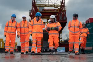 HS2-minister-Huw-Merriman-walks-on-top-of-the-high-speed-railways-first-and-longest-viaduct-rsz-300x200.jpg