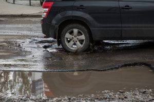 rain-road-car-pothole-puddle-street-300x200.jpg